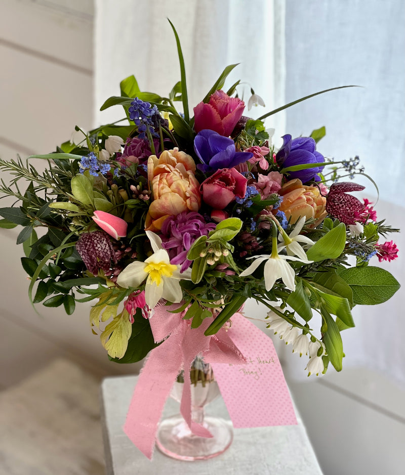 blooming plants, pink, yellow, violet, wrapped flower bouquet, green heart succulent