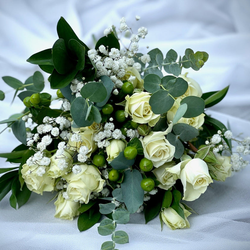 small flowers wrapped into a handtied bouquet to carry
