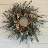 handmade wreath of eucalyptus and dried flowers and foliage