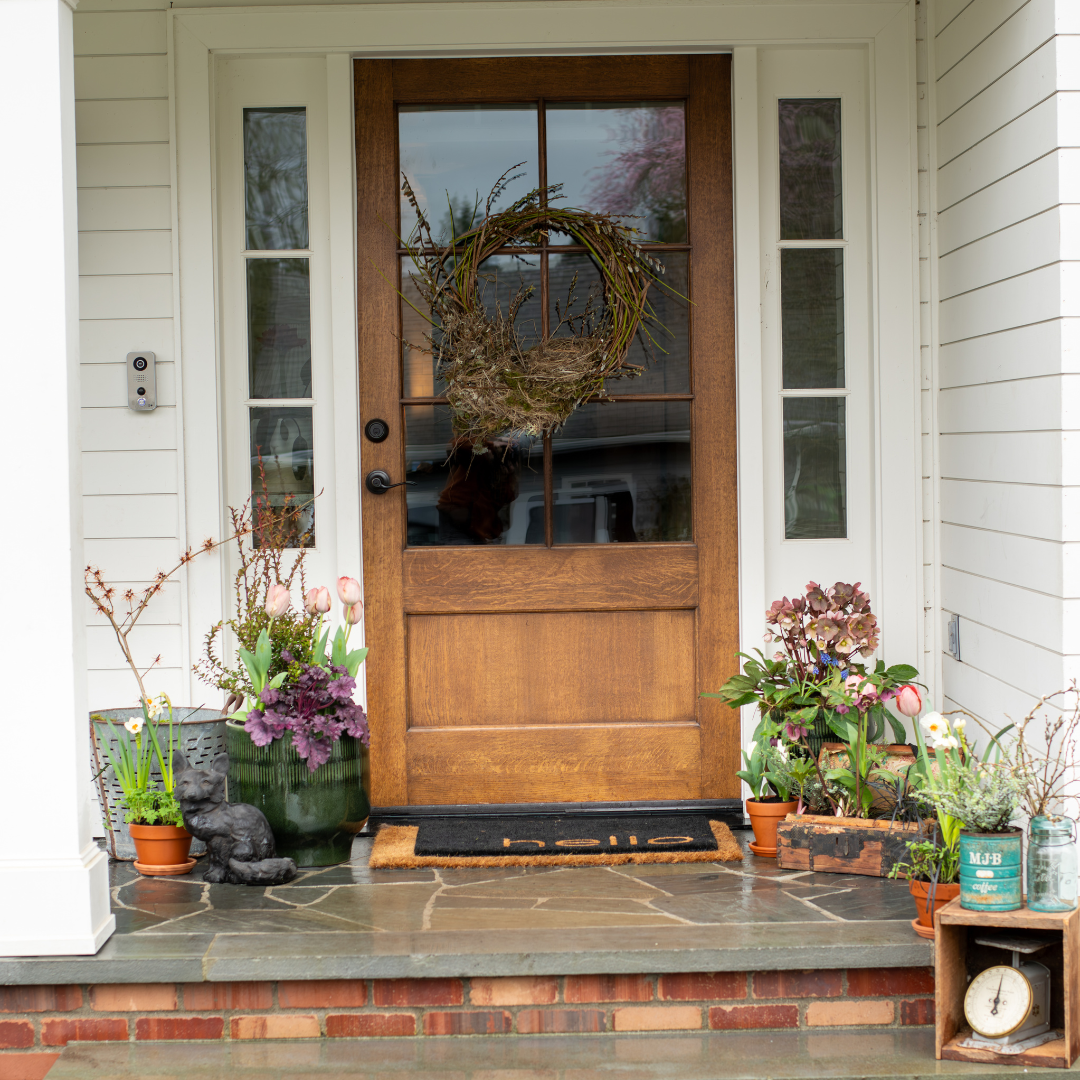 Front porch flowering pots with vintage accents