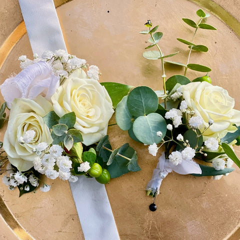 classic wrist corsage and boutonniere set with greenery