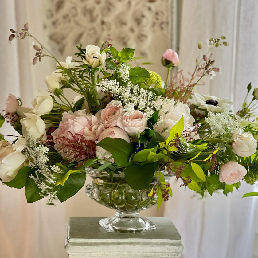 designers choice arrangement in footed glass vase