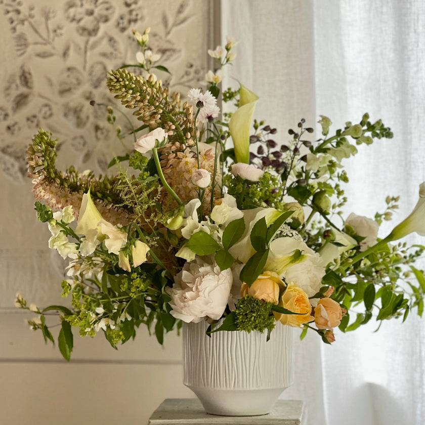 designers choice arrangement in ceramic vase